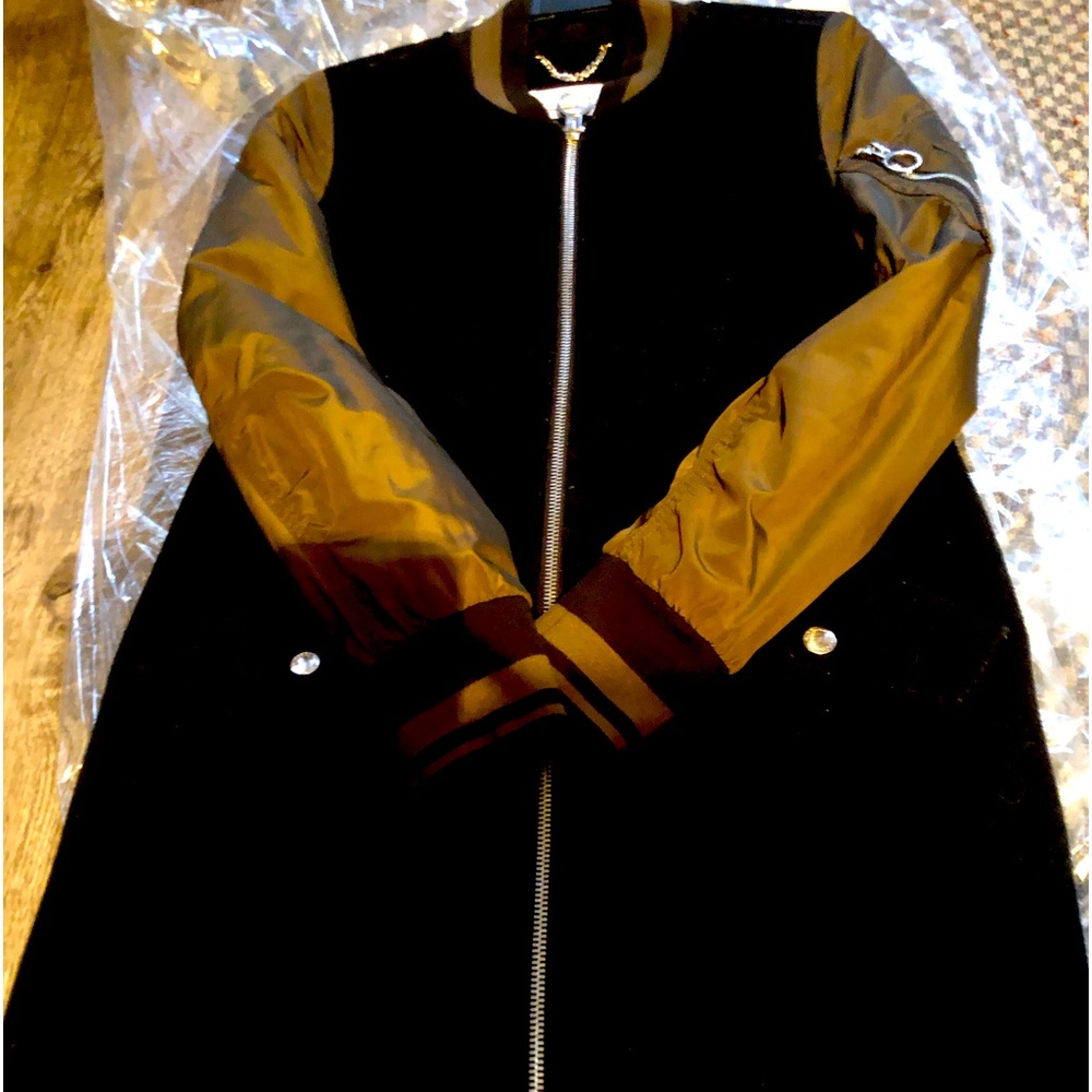 Woman’s BCBG Thigh-Length Jacket